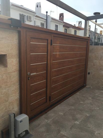 AMM Puertas Y Servicios puerta corredera marrón metal